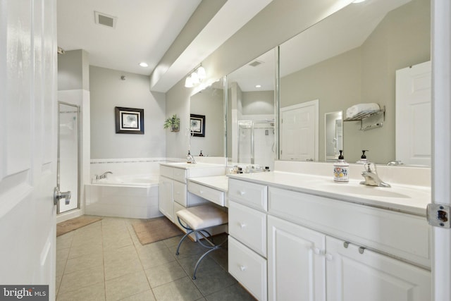 820 Belmont Bay Dr Unit 405, Woodbridge, VA 22191 - full bath with a shower stall, a garden tub, tile patterned floors, vanity, and visible vents