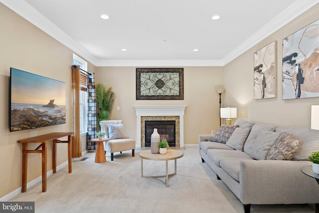 living area with crown molding, recessed lighting, a premium fireplace, and light carpet