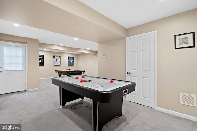 game room with baseboards, light carpet, and visible vents