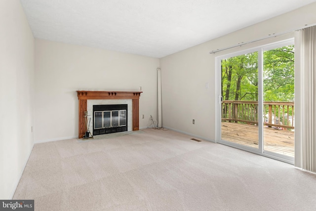 8005 Hillrise Ct, Elkridge, MD 21075 - unfurnished living room featuring carpet, a tiled fireplace, and baseboards
