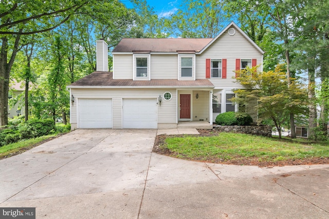 8005 Hillrise Ct, Elkridge, MD 21075 - traditional-style house with driveway and a chimney