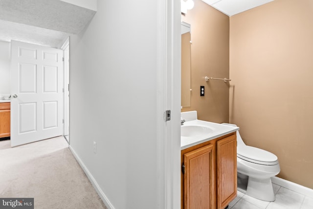 8005 Hillrise Ct, Elkridge, MD 21075 - bathroom featuring vanity, toilet, and baseboards