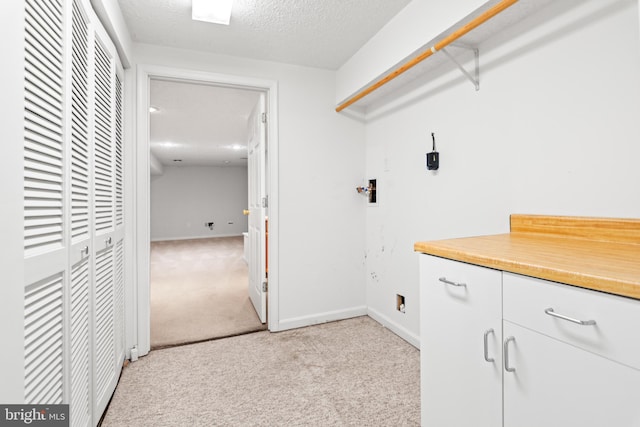 8005 Hillrise Ct, Elkridge, MD 21075 - laundry room with light carpet and baseboards