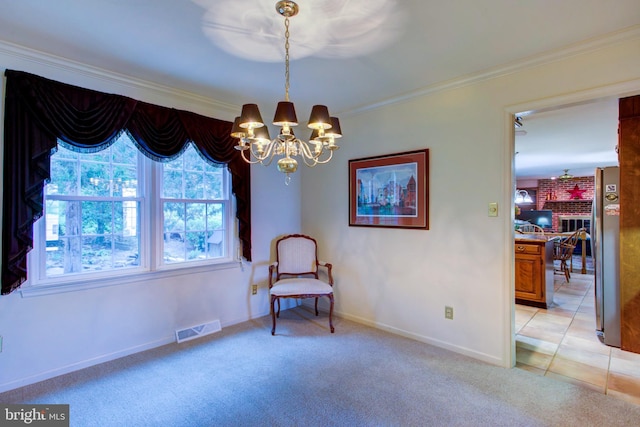 living area with an inviting chandelier, ornamental molding, light carpet, baseboards, and visible vents