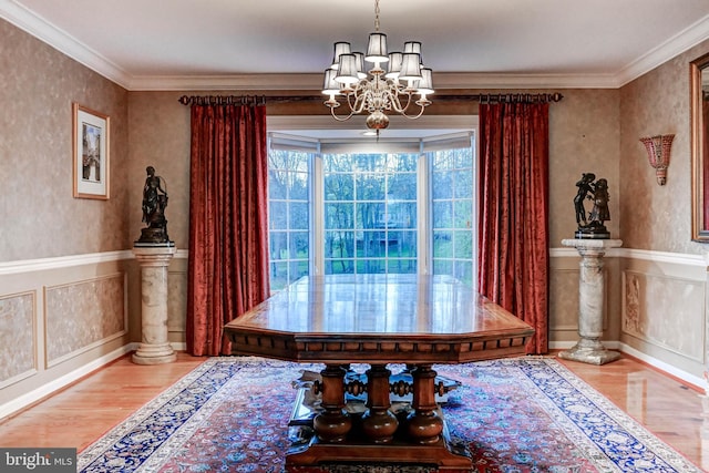 14712 Manor Rd, Phoenix, MD 21131 - dining room featuring wood finished floors, a chandelier, ornamental molding, and baseboards