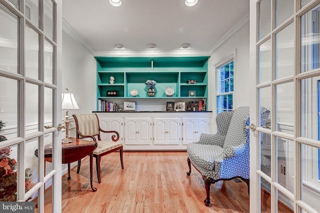14712 Manor Rd, Phoenix, MD 21131 - living area featuring ornamental molding, light wood-style flooring, and french doors
