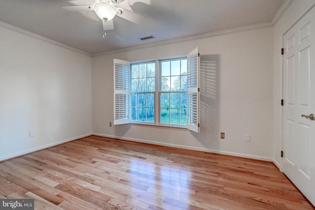 14712 Manor Rd, Phoenix, MD 21131 - spare room featuring crown molding, wood finished floors, ceiling fan, and baseboards