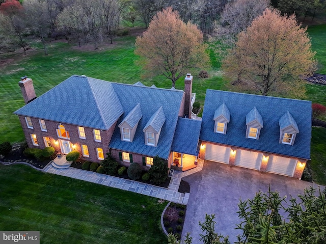 14712 Manor Rd, Phoenix, MD 21131 - view of front of property featuring a chimney, a front yard, and asphalt driveway