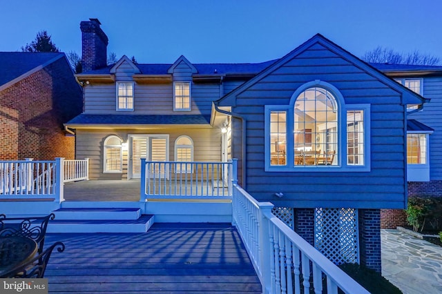 14712 Manor Rd, Phoenix, MD 21131 - back of property with a wooden deck and a chimney