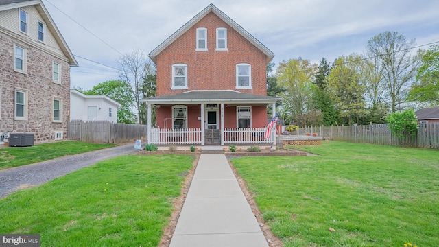 718 Walnut St, Royersford, PA 19468 - view of front of property with covered porch, central AC, and brick siding