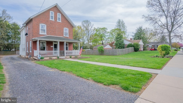 718 Walnut St, Royersford, PA 19468 - view of front facade featuring a porch and brick siding