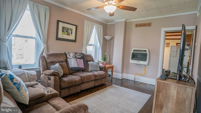 718 Walnut St, Royersford, PA 19468 - living area with heating unit, wood finished floors, ceiling fan, ornamental molding, and baseboards