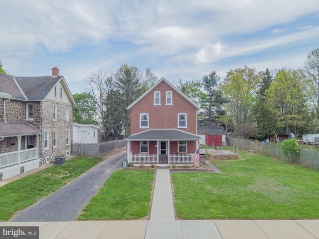718 Walnut St, Royersford, PA 19468 - view of front of property with a porch, central air condition unit, and asphalt driveway