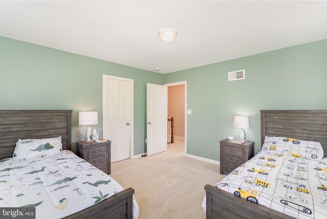 bedroom featuring carpet floors, baseboards, and visible vents