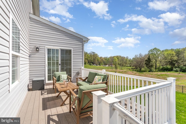 deck with an outdoor hangout area