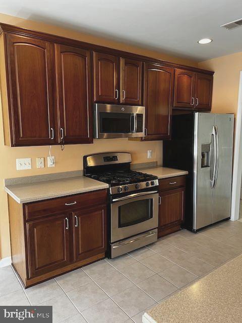 1402 Joppa Forest Dr Unit 12, Joppa, MD 21085 - kitchen featuring light countertops, stainless steel appliances, visible vents, and recessed lighting
