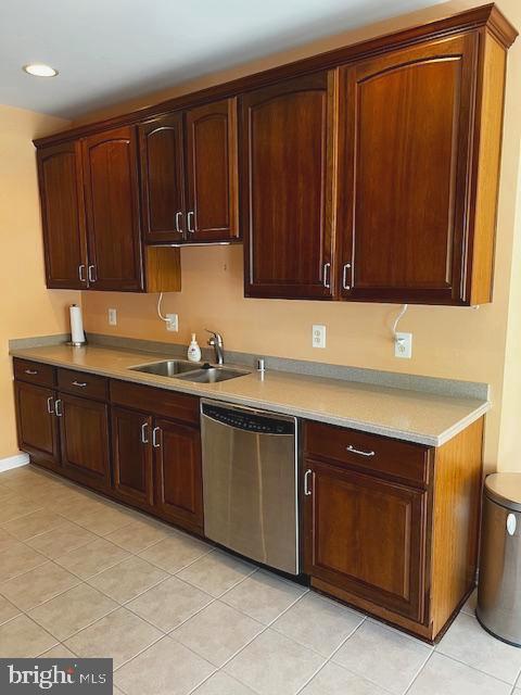 1402 Joppa Forest Dr Unit 12, Joppa, MD 21085 - kitchen featuring dishwasher, a sink, light countertops, recessed lighting, and light tile patterned flooring