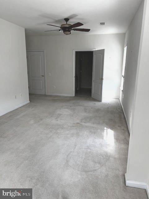 1402 Joppa Forest Dr Unit 12, Joppa, MD 21085 - carpeted empty room with baseboards, a ceiling fan, and visible vents