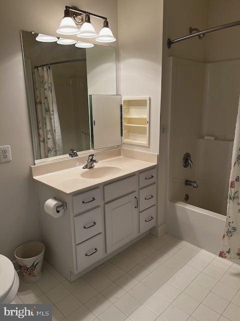 1402 Joppa Forest Dr Unit 12, Joppa, MD 21085 - full bath featuring tile patterned floors, vanity, toilet, and shower / tub combo with curtain