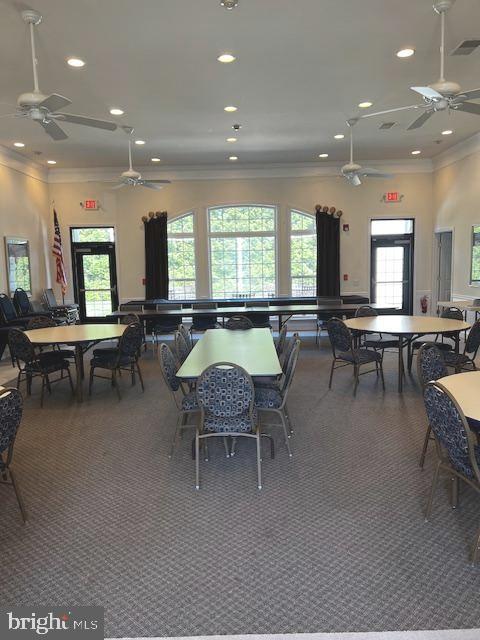 1402 Joppa Forest Dr Unit 12, Joppa, MD 21085 - carpeted dining space featuring plenty of natural light, ornamental molding, recessed lighting, and visible vents