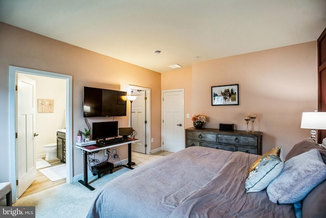 9008 Waller Tree Way, Upper Marlboro, MD 20772 - bedroom featuring light colored carpet, visible vents, connected bathroom, and baseboards