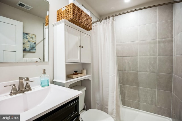 9008 Waller Tree Way, Upper Marlboro, MD 20772 - bathroom with toilet, a tile shower, visible vents, and vanity