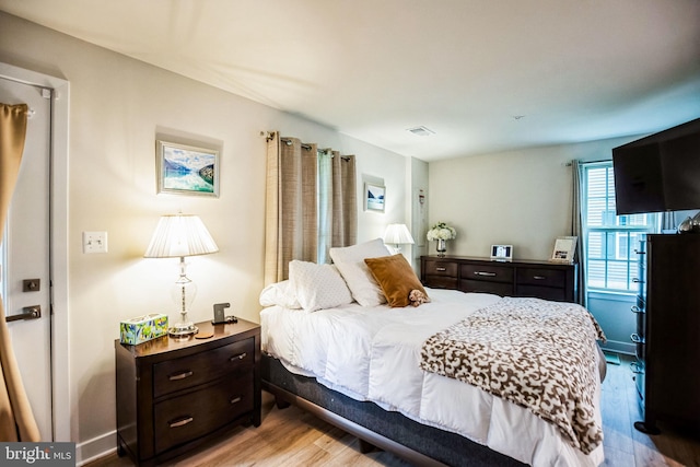 9008 Waller Tree Way, Upper Marlboro, MD 20772 - bedroom featuring visible vents and light wood-style flooring