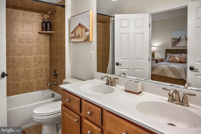 full bathroom featuring a sink, shower / bathtub combination with curtain, toilet, and double vanity