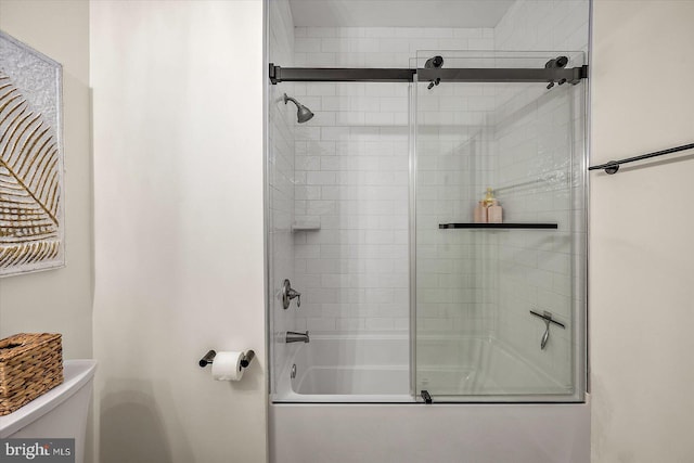full bathroom featuring toilet and enclosed tub / shower combo