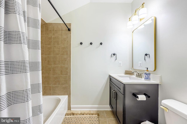 bathroom featuring vanity, tile patterned floors, toilet, and shower / tub combo with curtain