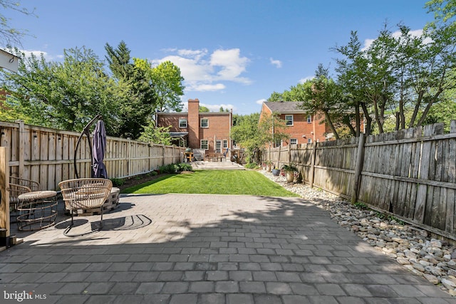 view of patio with a fenced backyard