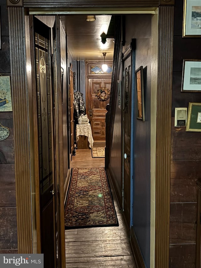 hall featuring wood finished floors
