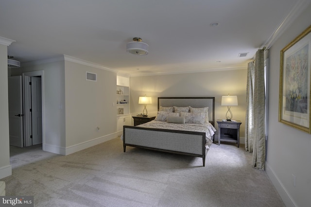 carpeted bedroom featuring crown molding, baseboards, and visible vents