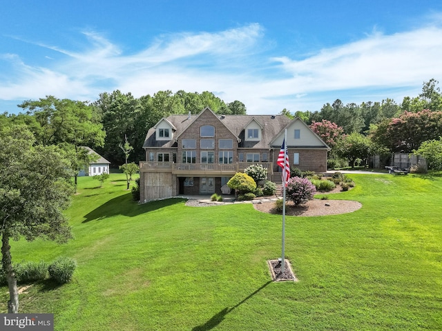 27885 Queentree Rd, Mechanicsville, MD 20659 - view of front of property featuring a wooden deck and a front yard