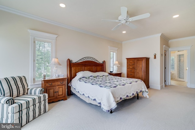 bedroom featuring recessed lighting, crown molding, multiple windows, and light colored carpet