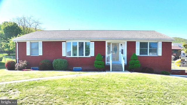 1550 Beacon St, Keyser, WV 26726 - ranch-style home featuring brick siding, a front yard, and roof with shingles