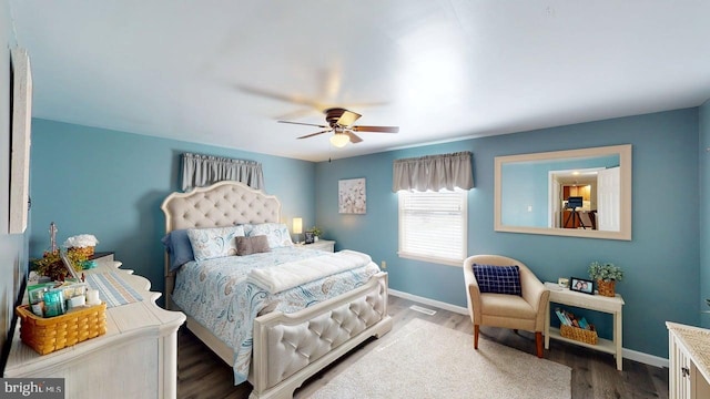 1550 Beacon St, Keyser, WV 26726 - bedroom featuring baseboards, ceiling fan, and wood finished floors