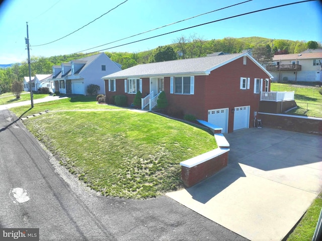 1550 Beacon St, Keyser, WV 26726 - view of front of home featuring a residential view, brick siding, a front lawn, concrete driveway, and an attached garage