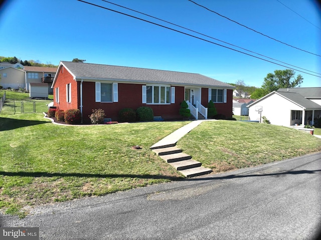 1550 Beacon St, Keyser, WV 26726 - ranch-style home featuring brick siding, fence, and a front lawn