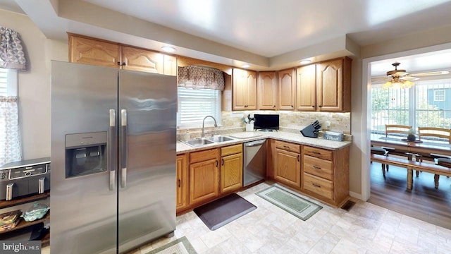 1550 Beacon St, Keyser, WV 26726 - kitchen with a sink, appliances with stainless steel finishes, backsplash, and a ceiling fan