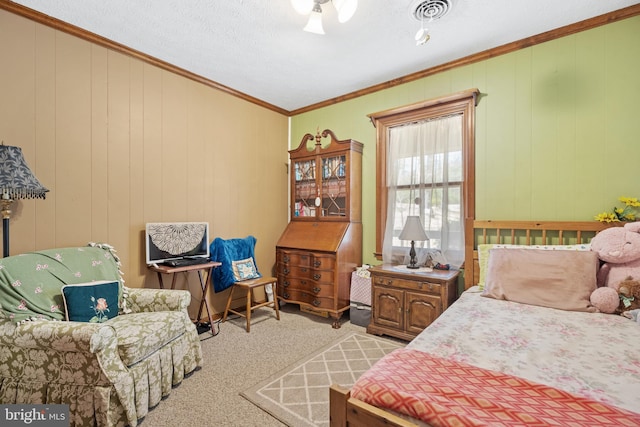 bedroom with light carpet, visible vents, and ornamental molding