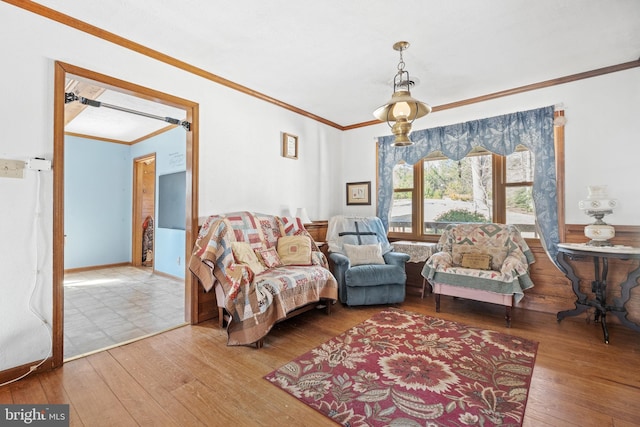 interior space with hardwood / wood-style floors and ornamental molding