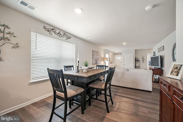 10883 Farmerfield St, Milford, DE 19963 - dining area with baseboards, dark wood-type flooring, visible vents, and recessed lighting