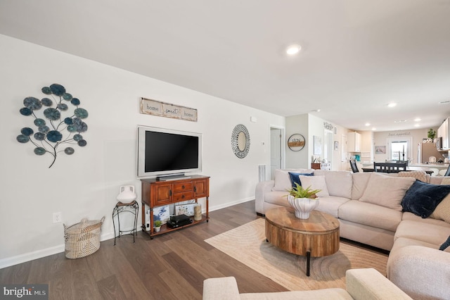 10883 Farmerfield St, Milford, DE 19963 - living room featuring baseboards, dark wood-style flooring, and recessed lighting