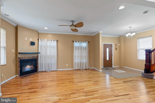 4626 Kavon Ave, Baltimore, MD 21206 - foyer entrance with ceiling fan with notable chandelier, plenty of natural light, and wood finished floors