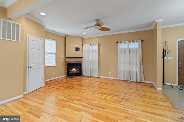 4626 Kavon Ave, Baltimore, MD 21206 - unfurnished living room featuring ceiling fan, crown molding, visible vents, and wood finished floors