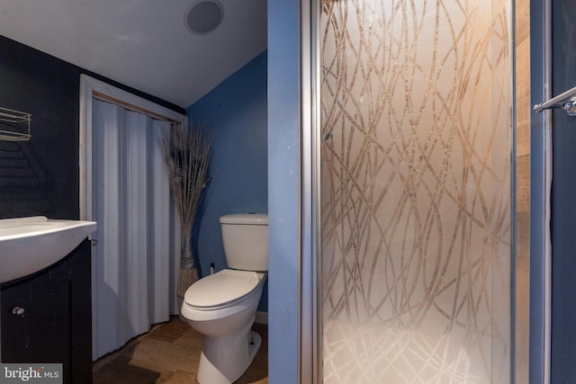 4626 Kavon Ave, Baltimore, MD 21206 - bathroom featuring vaulted ceiling, vanity, toilet, and a shower
