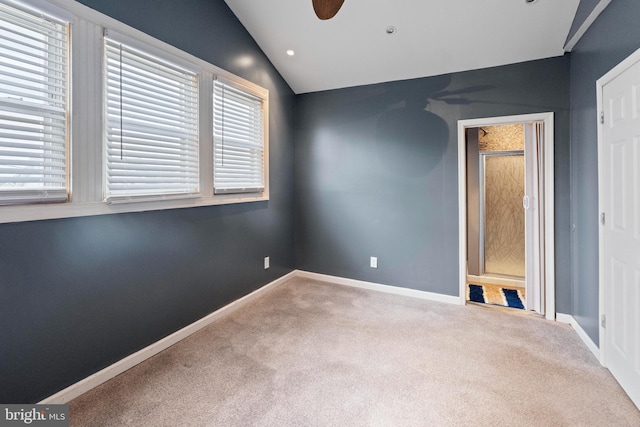 4626 Kavon Ave, Baltimore, MD 21206 - empty room with a wealth of natural light, baseboards, lofted ceiling, and carpet floors