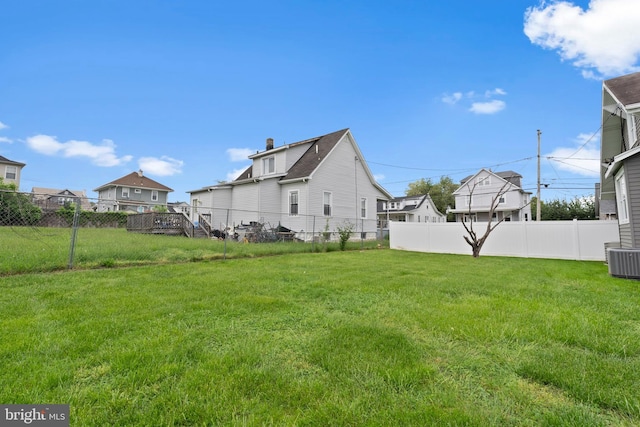 4626 Kavon Ave, Baltimore, MD 21206 - view of yard featuring cooling unit and a fenced backyard