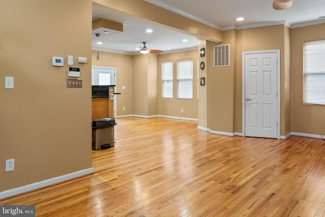 4626 Kavon Ave, Baltimore, MD 21206 - interior space featuring crown molding, visible vents, baseboards, ceiling fan, and light wood-style floors